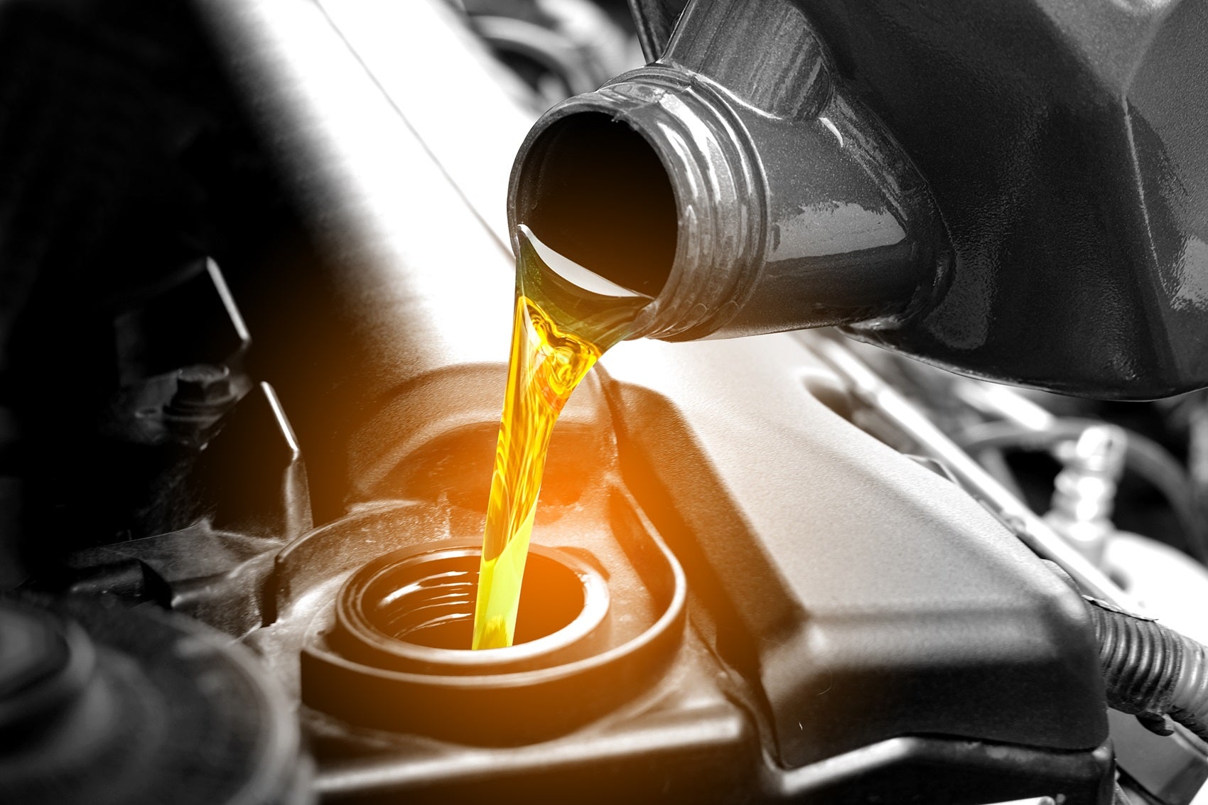 Close up picture of Ford Oil Change - oil being poured